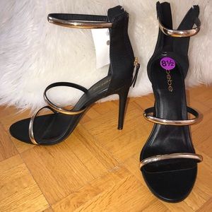 Bebe Gold Strap Heels